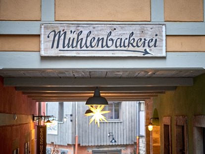Naturhotel - Sächsische Schweiz - Täglich frisches Brot, Brötchen sowie süße und herzhafte, wagenradgroße Kuchen kommen aus unserer hauseigenen Mühlenbäckerei - Bio- & Nationalpark-Refugium Schmilka